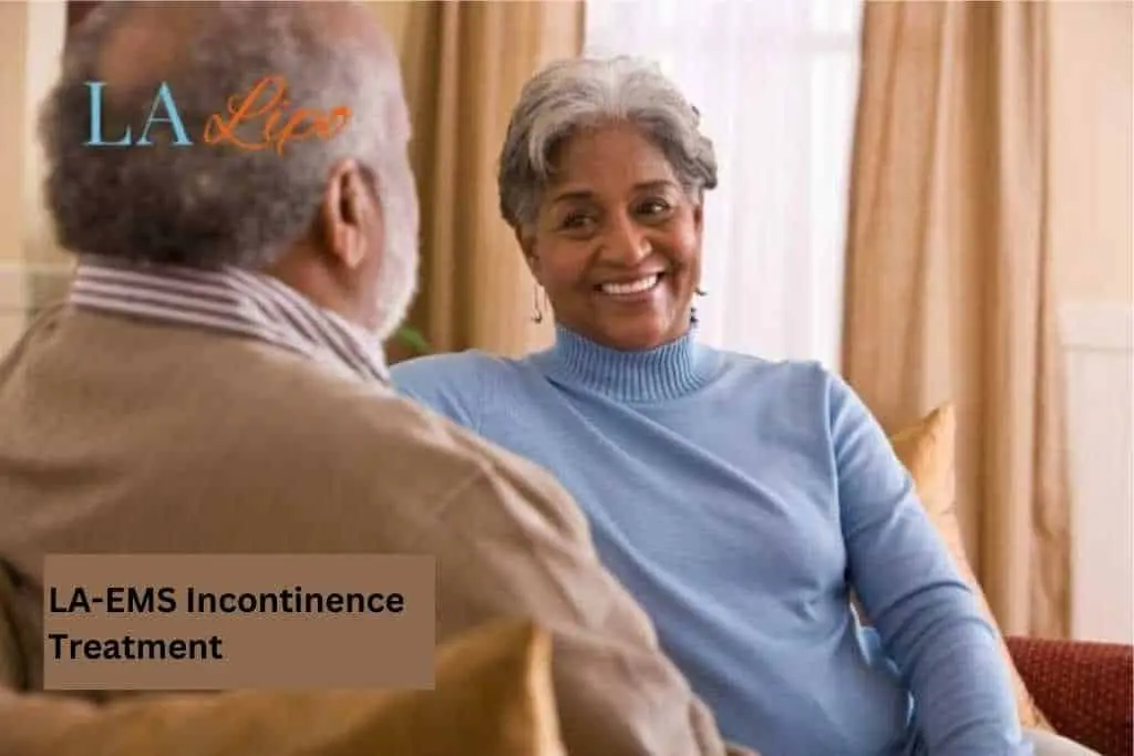 Couple sat smiling at each other - LA-EMS treatment Mortlake