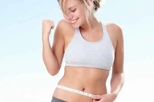 woman happy after fat reduction treatment Mortlake
